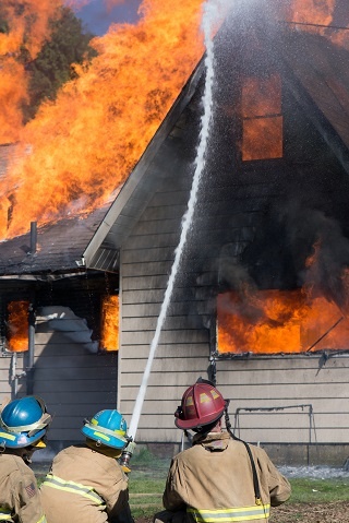 Firemen in Action putting out a fire